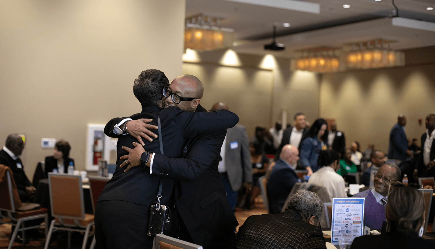 Certified business owners and corporate buyers greeting each other at an OMSDC event